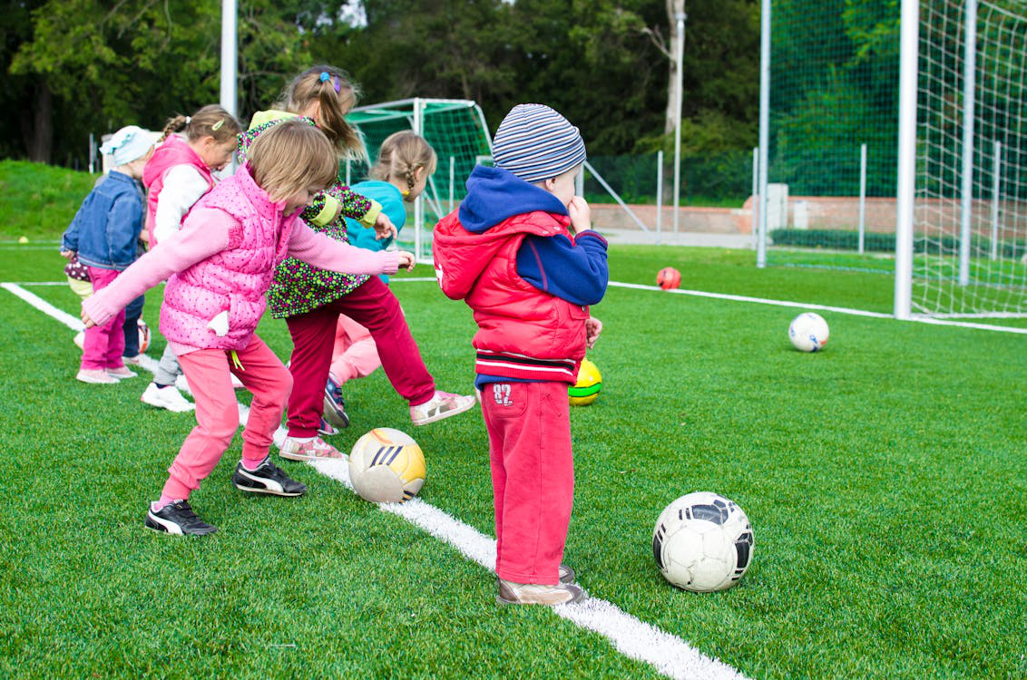 Kids playing on the field.